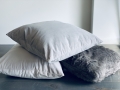 grey velvet and fur pillows